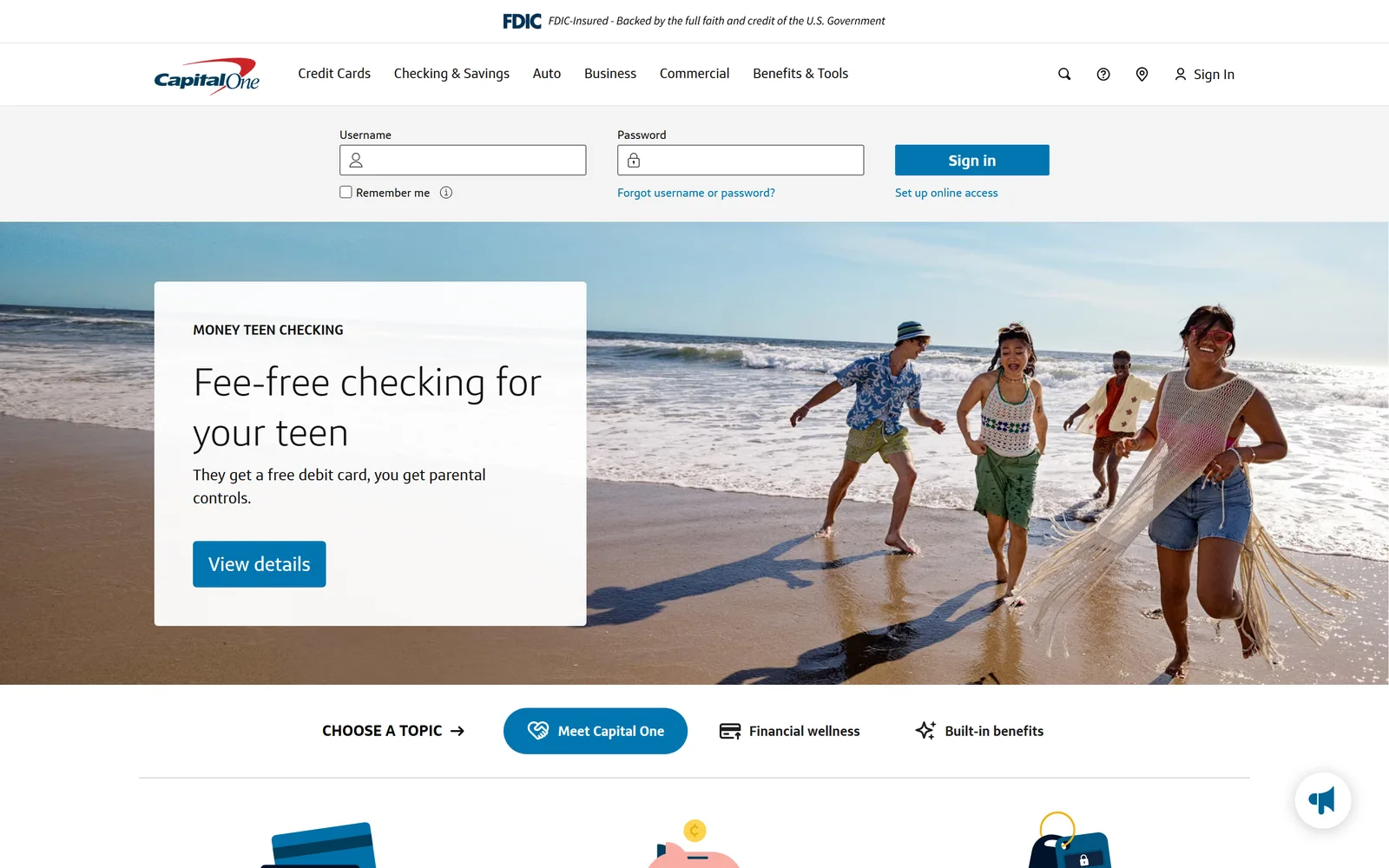 Capital One's homepage with the FDIC official digital sign pinned above the logo and navigation, followed by a username and password sign-in module, with the first photograph below all of it.