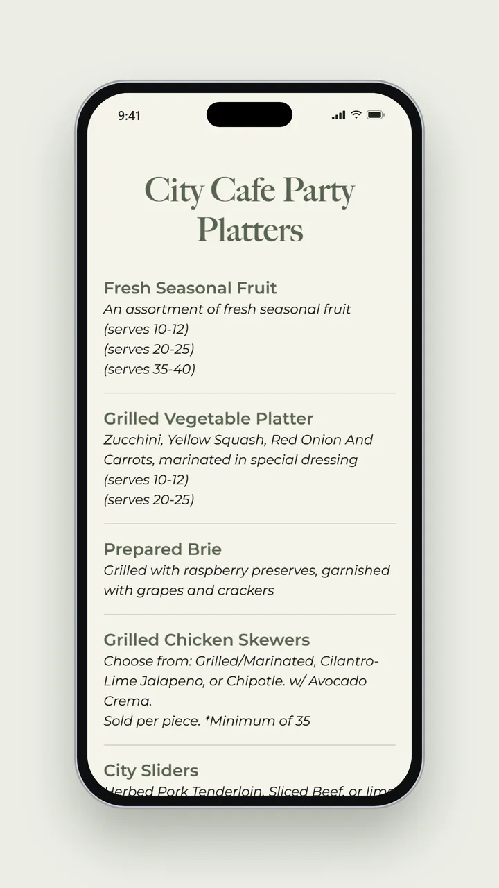 The catering menu on a phone, showing the City Cafe Party Platters heading with Fresh Seasonal Fruit in sizes that serve 10 to 12, 20 to 25 or 35 to 40, a Grilled Vegetable Platter, Prepared Brie, and Grilled Chicken Skewers sold per piece with a minimum of 35.