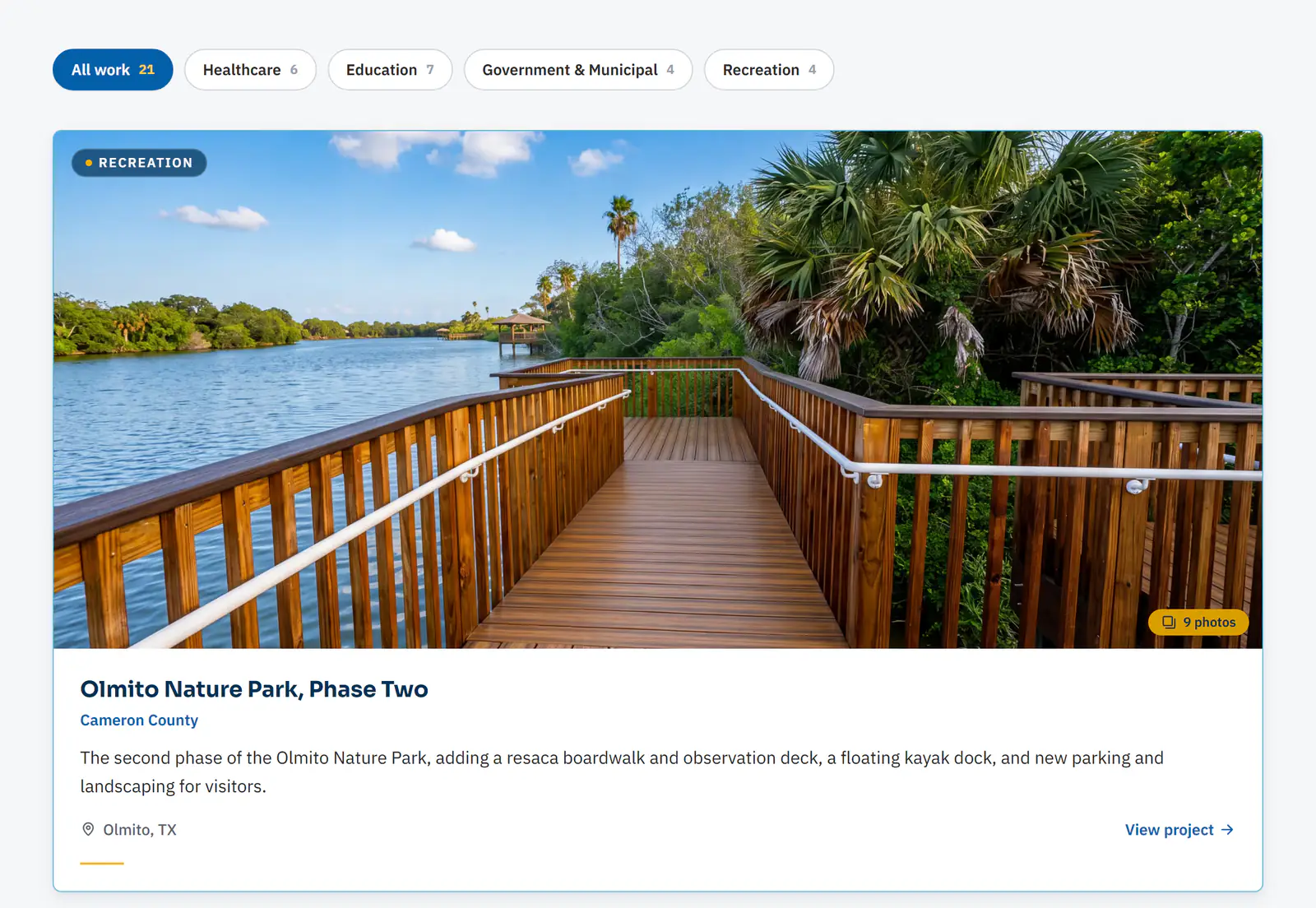The Our Work page on holchemont.com: filter buttons for All work 21, Healthcare 6, Education 7, Government & Municipal 4 and Recreation 4 above a wide project card for Olmito Nature Park, Phase Two, Cameron County, with a photo of a wooden boardwalk along a resaca, a Recreation tag, a 9 photos badge, a one-line description, Olmito, TX and a View project link.